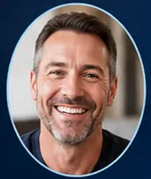 Portrait of an older gentleman smiling warmly